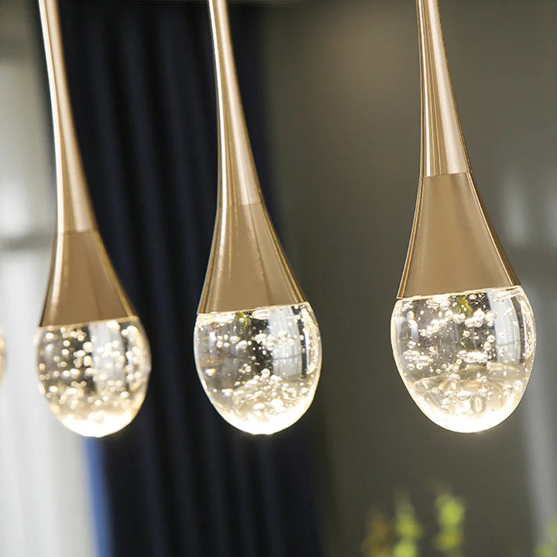 GoldenBubble™ – LED-Hängeleuchte in Gold mit Kristalltropfen & Modernem Design